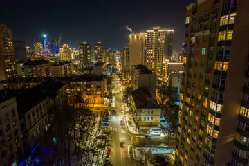 Fototapeta premium City landscape in Kyiv at night. Aerial photography.