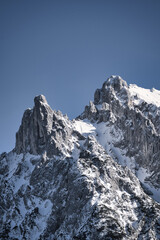 Karwendel - winter landscape with snow covered mountains, rocks and blue sky