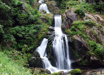Fototapeta na wymiar Long Exposure Of The Triberg Falls In Black Forest Germany On A Beautiful Summer Day
