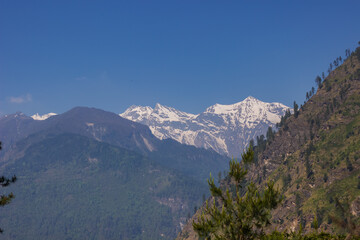 View of alpine snow-capped peaks in the Himalayas