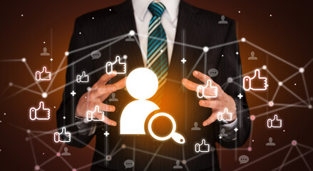 Fototapeta premium Hand holding social media icons