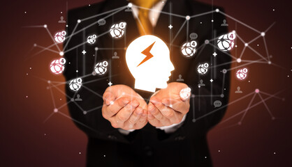 Hand holding social media icons