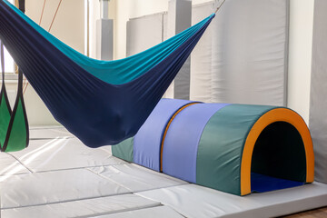 sensory integration room in the center for children. gym for gymnastics and rehabilitation of...