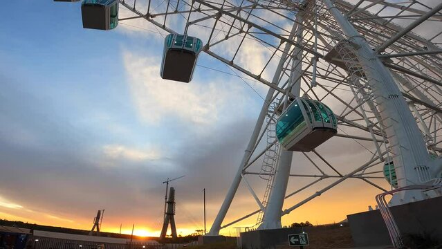 Ferris wheel in Foz do Igua&ccedil;u, Brazil at sunset.