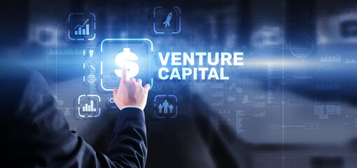 Venture capital. Investor capital. Businessman pressing virtual screen inscription