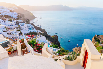 Beautiful view of Oia with traditional white houses, Santorini island, Greece - obrazy, fototapety, plakaty