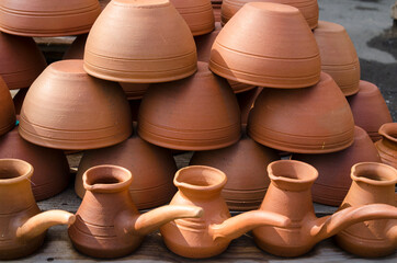 Fototapeta na wymiar clay pots and coffee pots for sale