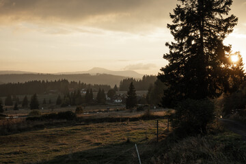 Sunset at Filipova Hut and view on Roklany mountains, Sumava national park