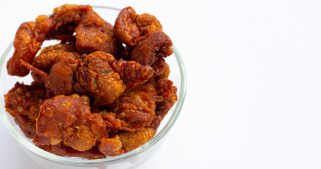 Chispy fried chicken skin in glass bowl