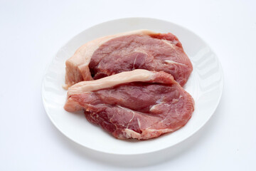 Pork meat on white background.