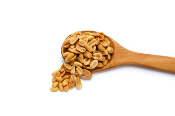 Peanut in wooden spoon on white