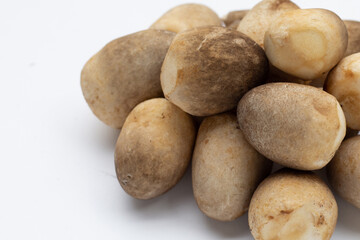 Straw mushroom on white background.