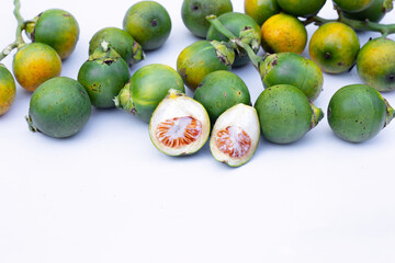 Betel nuts on white background.