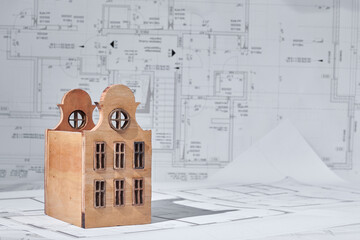 House building project concept with plans