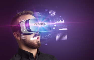 Businessman looking through Virtual Reality glasses