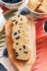 Kospa or jent - Kazakh traditional treat with raisins or nuts, usually made with flour of roasted barley or wheat. Very healthy food.