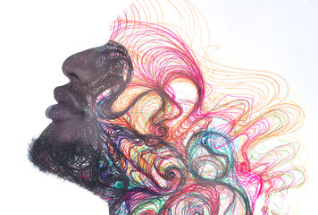 A portrait of a man dissolving into wavy lines a double exposure technique.
