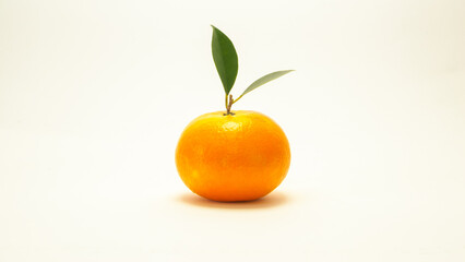 Fresh-looking yellow fruit oranges on a white background.Vitamin-rich fruit and good for health Advertising concept and healthy food