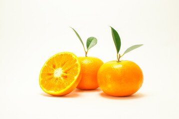 Group of oranges. Fresh-looking yellow fruit on a white background. Fruits with vitamins and good health focus on specific points. Advertising concept and healthy food, space for text