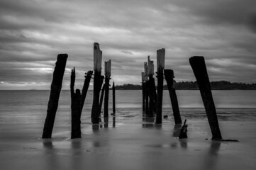 Washed out pier in black and white