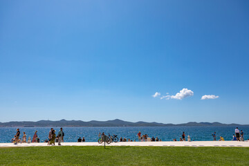 Zadar, Croatia &ndash; August 2021. idyllic promenade on the shores of the blue Adriatic Sea on the shores of the city of Zadar