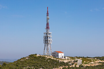 Fototapeta na wymiar Zadar, Croatia - August 2021 - large 5G repeater tower for mobile phones dominates the landscape