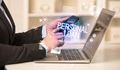 Side view of a business person working on laptop