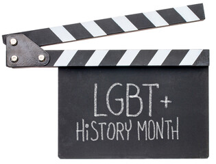 Obraz premium LGBT Heritage Month, white chalk handwriting on a clapboard, reminder of annual monthly event