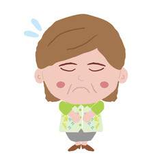 沖縄のかりゆしウェアを着た中年女性が謝る