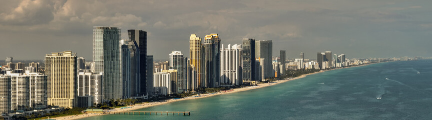 Aerial drone panorama Miami Beach Sunny Isles highrise condo buildings on the sand