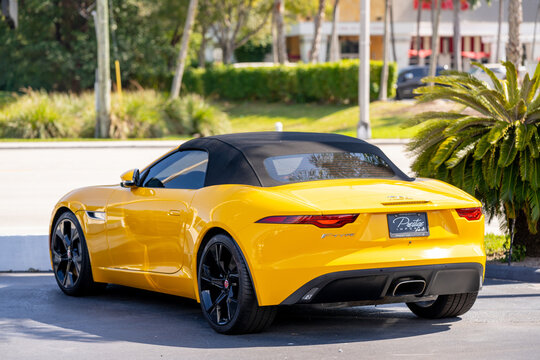 Miami, FL, USA - February 5, 2022: Photo of a Yellow Jaguar F Type sports car