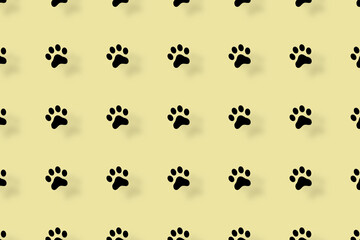 Fototapeta na wymiar Colorful pattern of cat paws on yellow background with shadows. Seamless pattern with cat paw. Dog, cat footprint background
