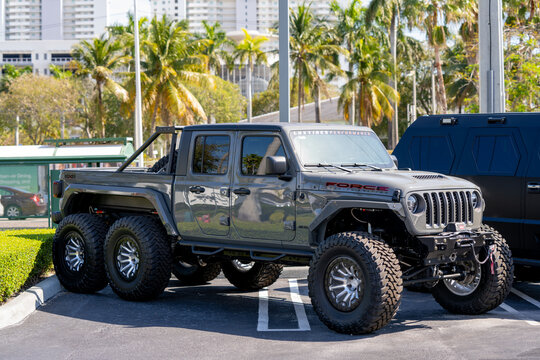 Miami, FL, USA - February 5, 2022: Photo of a custom built Jeep Wrangler Rubicon 6x6 6 wheel drive