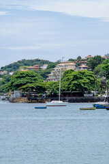 Fototapeta na wymiar View from the sea of beaches with boats and sailboats - Armação de Búzios, Rio de Janeiro, Brazil