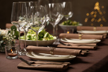 Stylish elegant table setting for festive dinner in restaurant