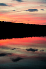 Sunset lake silhouette in Finland
