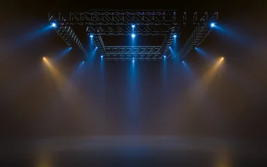 Fotobehang Empty stage with lighting equipment on a stage. Spotlight shines on the stage. 3d rendering © pom669