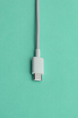 USB cable type C over blue background