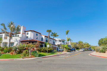 Intersection road in a residential area with mediterranean style houses at San Clemente, California