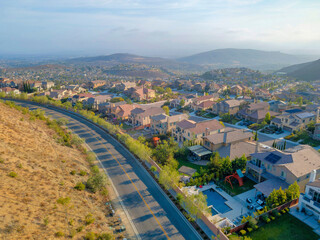 Fototapeta na wymiar View of a suburban residential area near the highway at Double Peak Park at San Marcos, California