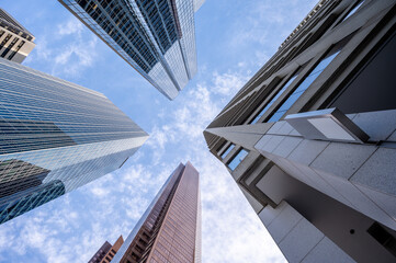 Looking up at skyscrapers in the city of Calgary.