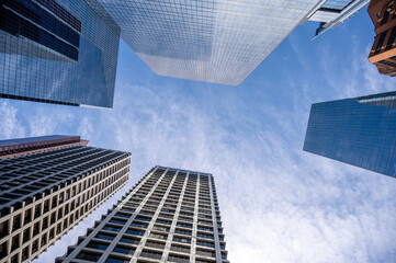 Fototapeta na wymiar Looking up at skyscrapers in the city of Calgary.