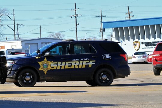 Reno County Sherriff car on the street with blue sky in Hutchinson Kansas USA.