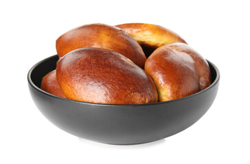 Bowl with delicious baked pirozhki on white background