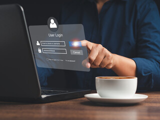 Cyber security concept. The login page on the virtual screen to the computer system on the laptop.
