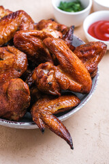 Closeup barbecue chicken wings on table. Top view.