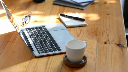Close-up, A simple portable workspace in coffee shop with portable laptop