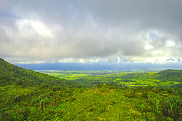 Aerial view of the south coast of Mauritius island from a hill located near Piton Savanne