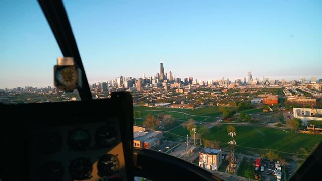 First Person View Of A City Skyline From The Inside Of A Flying Helicopter Cockpit, Point Of View From A Chopper With Selective Focus