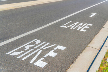 Bike lane sign on the road at the Ladera Ranch in Southern California